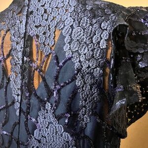 New, size 10, MacDuggal dress. Never been worn.